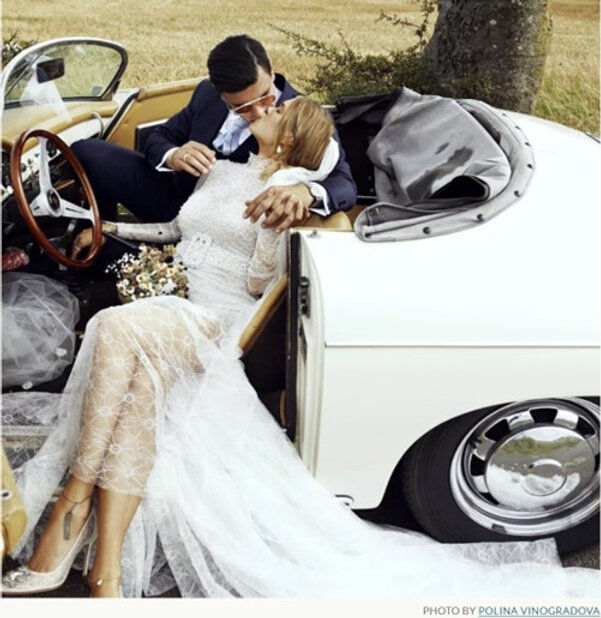 Bride and Groom in an Antique Convertible
