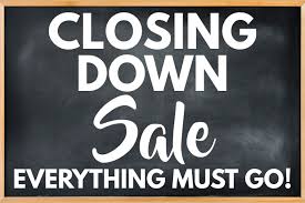 Black and white store closing sale sign