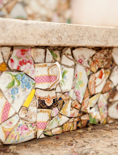 Mosaic vintage dishes and tea cup wall