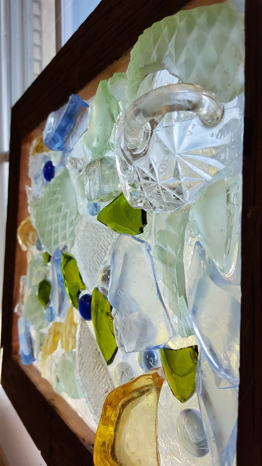 Broken glass framed collage