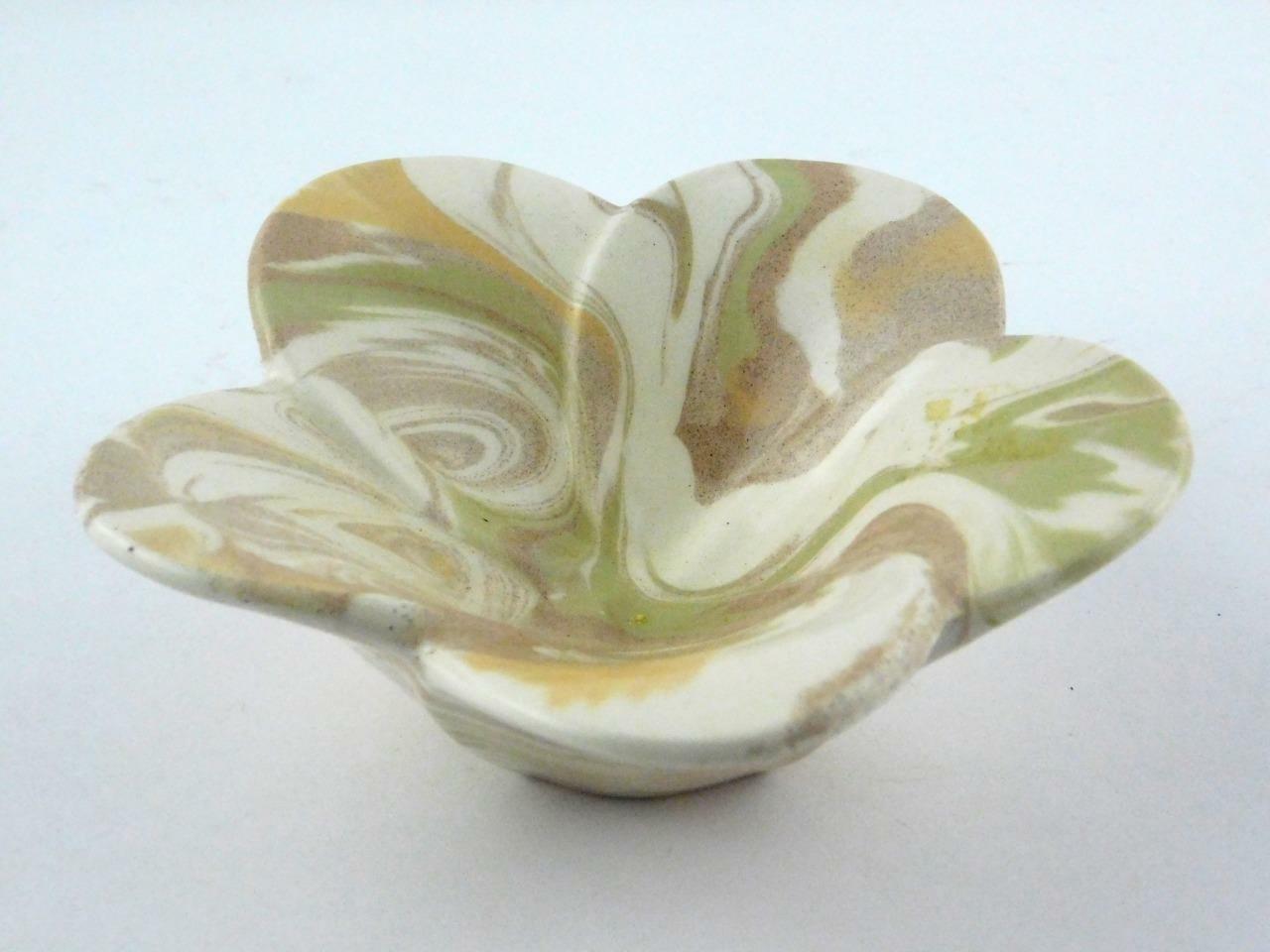 Green yellow and white marbleized flower-shaped pottery bowl