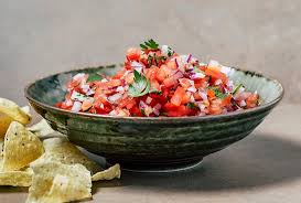 salsa in a green pottery bowl